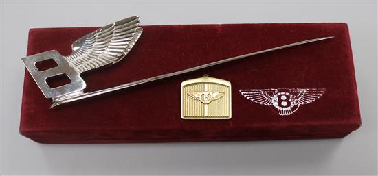 An 18ct gold Bentley key ring and Bentley letter opener in box.